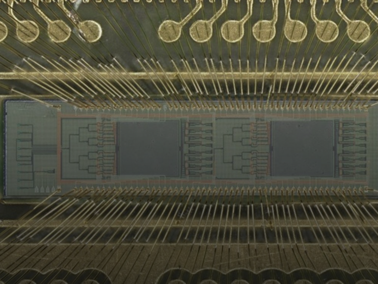 A close up photo of a microchip processor.